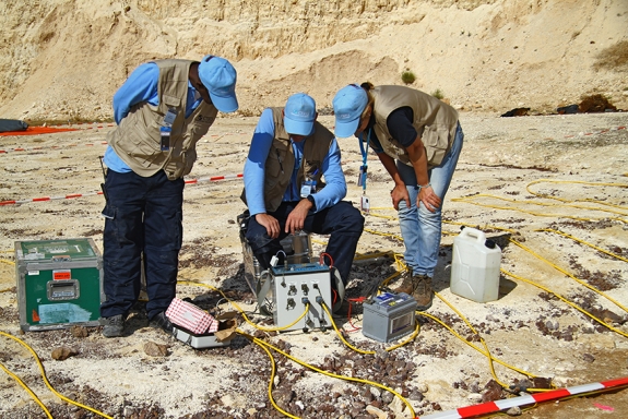 OSI inspection team conducting electrical field measurements