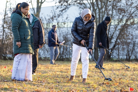 Participants working with equipment used to detect signs of nuclear testing