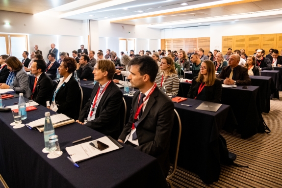 Participants listening to presentations at workshop