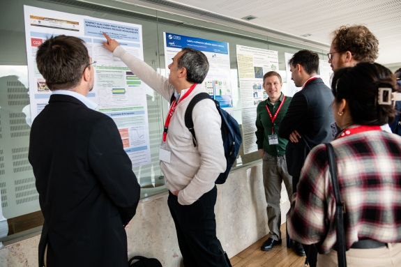 Participants explore presentation material at workshop