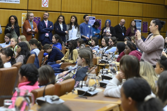 Audience listening to speakers’ statements