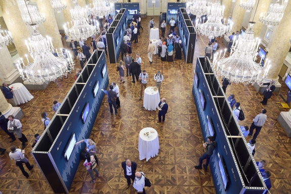 Bird-eye view of hall where 455 e-Posters, digital posters, are being presented at SnT2023