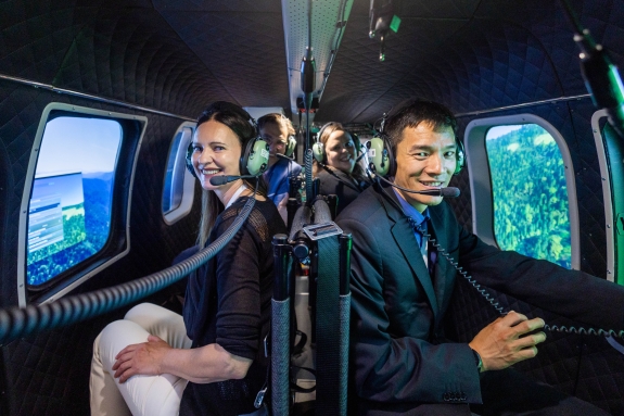 Participants taking part in OSI flight simulation session