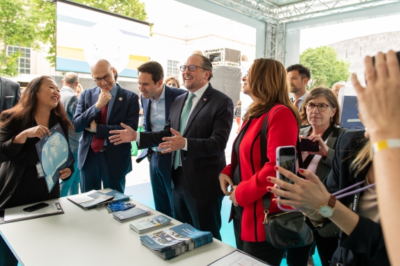 Officials touring booths