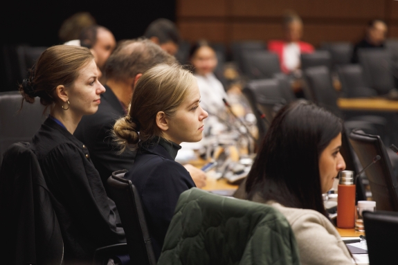 Participants listening to presentations