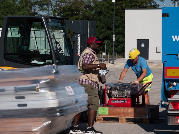 Participants preparing deployment of 120 tonnes of OSI equipment 