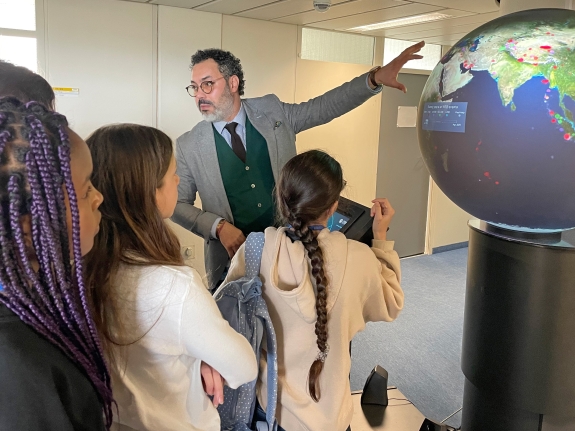 Yassine Chaari, Capacity Building and Training Officer, explaining CTBTO’s verification regime to participants on Daughters’ Day 2023 
