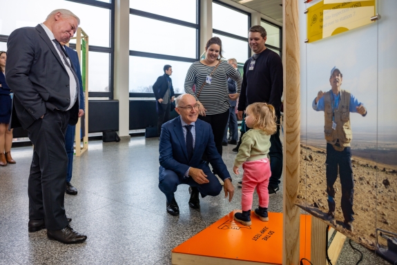 Child doing jump test during opening event