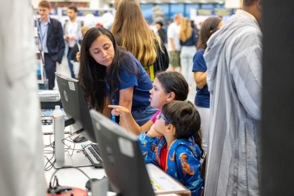 International Data Centre (IDC) staff showing children how data is analysed