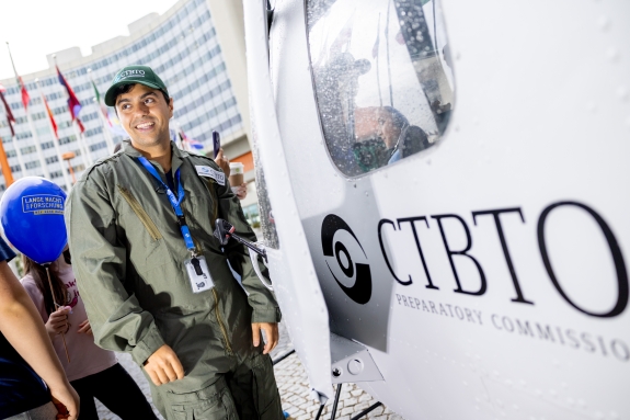 OSI staff with helicopter simulator 