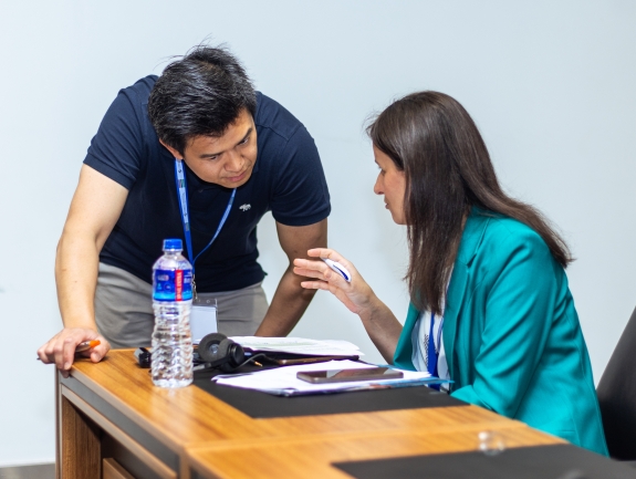 CTBTO staff speaking to participant