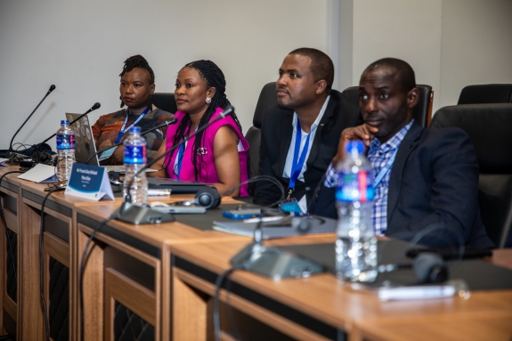 Journalists listening to presentation during media clinic 