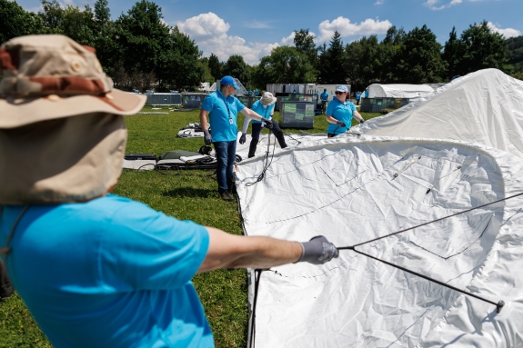 Surrogate inspectors work together to set up the Base of Operations (BoO)