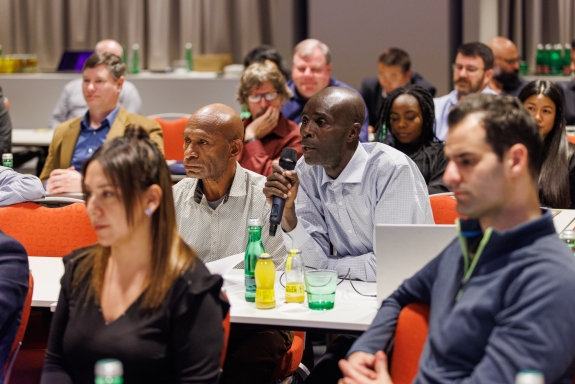 John Akech, IMS station operator (Kenya), posing question during panel discussion