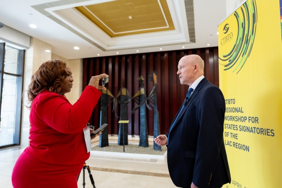 Journalist interviewing Gerhard Graham, coordinator of International Data Centre (IDC) Division