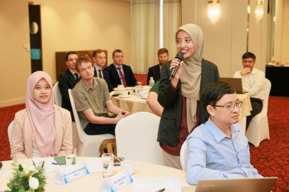 Participants asking questions during workshop  