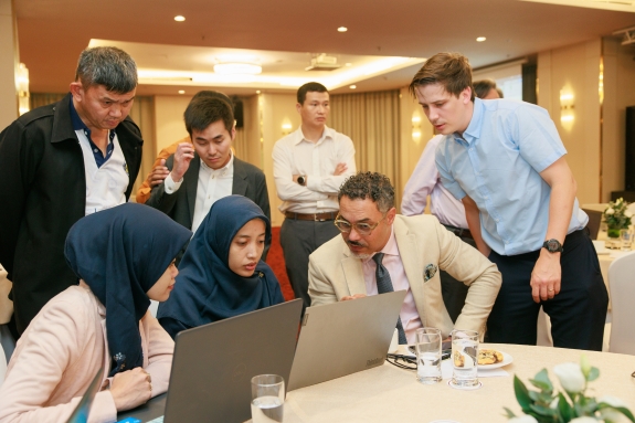 Yassine Chaari, Capacity Building and Training Officer at CTBTO working alongside participants during simulation exercise  