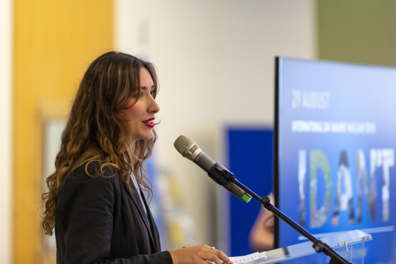 Chiara Cogliatti, representing CTBTO Youth Group (CYG) reading her poem at Vienna event 
