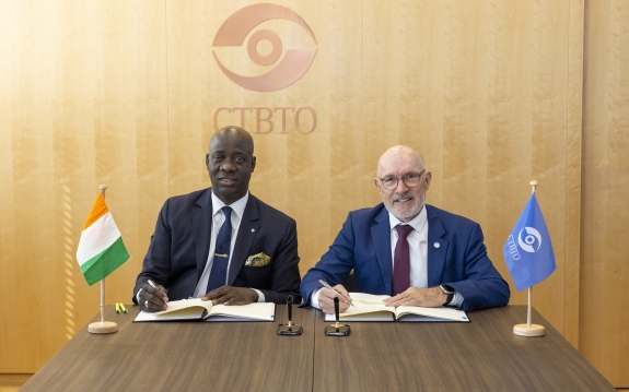 His Excellency Mr. CISSE Yacouba, Ambassador, Permanent Representative and ES Robert Floyd signing the agreement